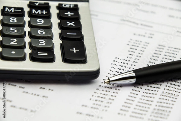 Fototapeta Bank statement with calculator and pen