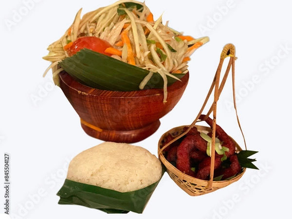Fototapeta Papaya salad served with fried pork and sticky rice