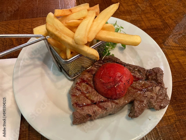 Fototapeta Beef Steak with Sauce and Sides