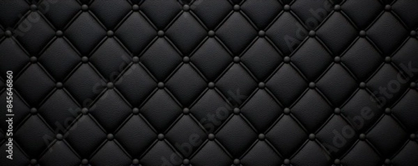 Fototapeta Black leather upholstery with buttons forming a diamond pattern background