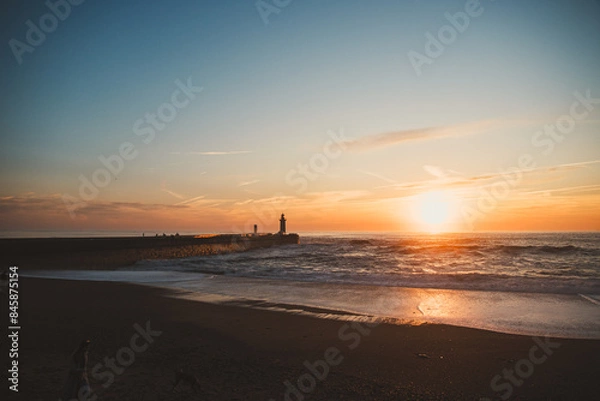 Obraz Sunset in the ocean by the lighthouse