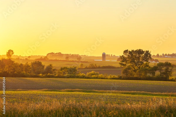 Obraz Farm and fields and trees at sunset in northeastern Iowa during the late spring