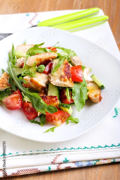Obraz Chicken breast, rocket, cucumber and tomato salad