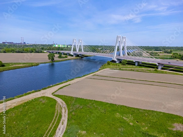 Fototapeta Aerial view landscape, view of fields, meadows, river and bridge. Photo from a drone.