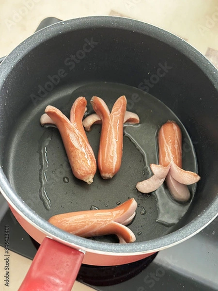 Obraz Pan frying Sausage