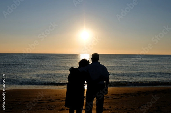 Obraz Elderly couple at sunset