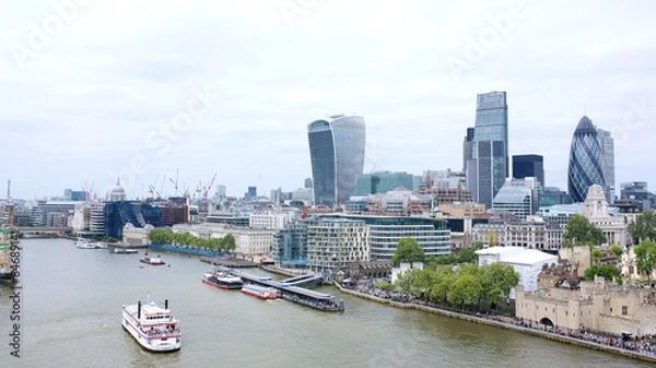 Fototapeta Beautiful breath-taking panoramic scenic view on London's cityscape from the Tower Bridge Exhibition. Spectacular view of St. Paul’s Cathedral dome, the Gherkin and the City from the West Walkway