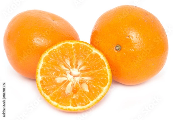 Fototapeta Ripe tangerines on a white background
