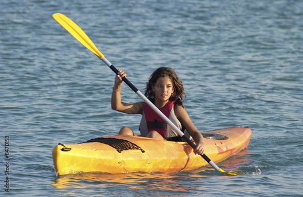 Obraz Young girl learning to kayaking