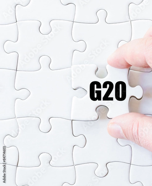 Fototapeta Last puzzle piece with word G20