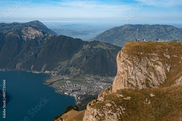 Fototapeta Ingenbohl village and Fronalpstock summit viewpoint in Switzerland. Swiss Alps iconic view