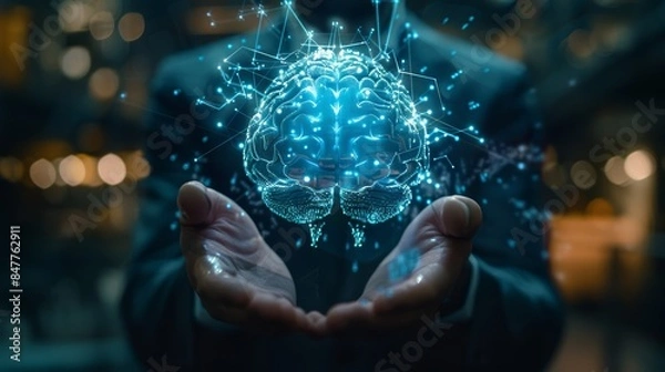 Fototapeta A corporate setting with a businessman holding a glowing brain hologram, highlighting AI and innovation