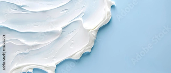 Obraz Close up of White Toothpaste Isolated on a Solid Blue Background with Empty Copy Space for Text. Macro Top View of Dental Care Concept Advertisement Commercial Banner, Teeth Hygiene Advertising Cover