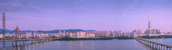 Fototapeta Scenic Sunset Panorama view at Jamsil Railway Bridge over the Han River (Hangang). Wonderful cityscape. (May 26 2024)