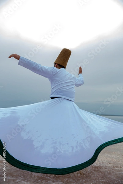 Fototapeta Sunset and whirling at the sea, sufi. sufi whirling (Turkish: Semazen) is a form of Sama or physically active meditation which originated among Sufis.