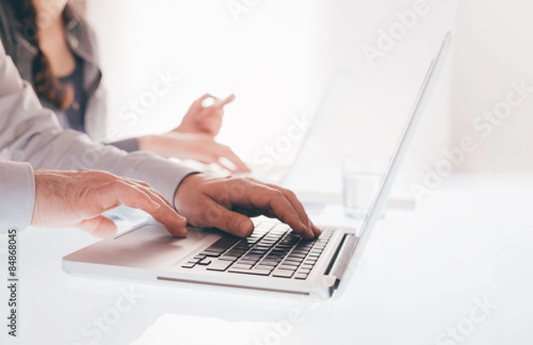Fototapeta Business team working at office desk