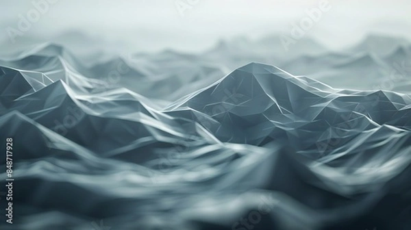 Fototapeta Soft gradients wash over a low poly geometric landscape, casting shadows and highlights in shades of gray.