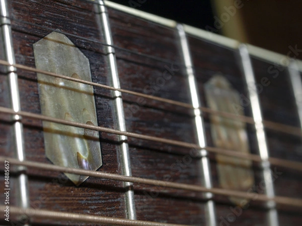 Obraz closeup shot of guitar and strings 
