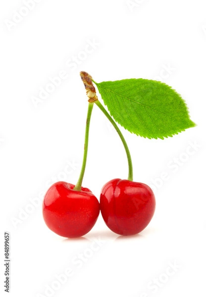 Fototapeta Ripe cherries with a leaf.
