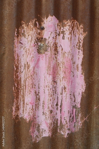 Fototapeta Cracked pink paint on rusty sheet metal, nice background with texture, abstract painting, pink concept