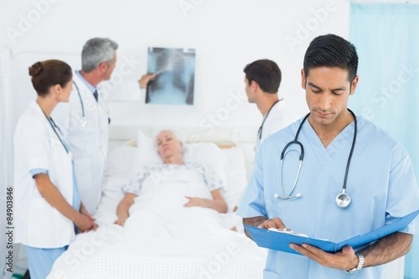 Fototapeta Report reading with colleagues and patient behind