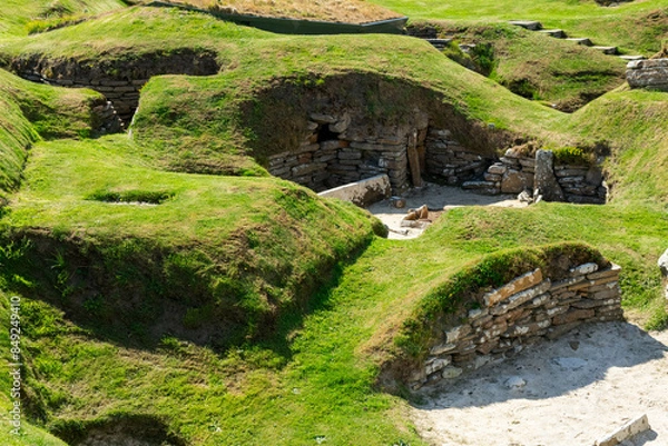 Fototapeta Skara Brae Scotland neolithic site ona  sunny day from Kirkwall port, stone building from ancient times