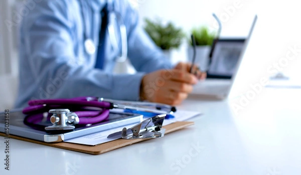 Fototapeta Doctor type keyboard with stethoscope