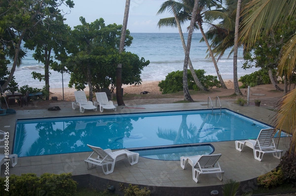 Obraz A Swimming Pool at a Beach Resort in Sri Lanka