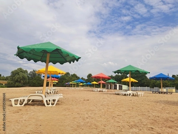 Obraz Umbrellas on the beach territory