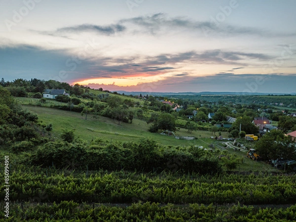 Fototapeta Hungary - Etyek at sunset time from drone view