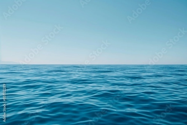Fototapeta Calm Ocean Water under Clear Sky.