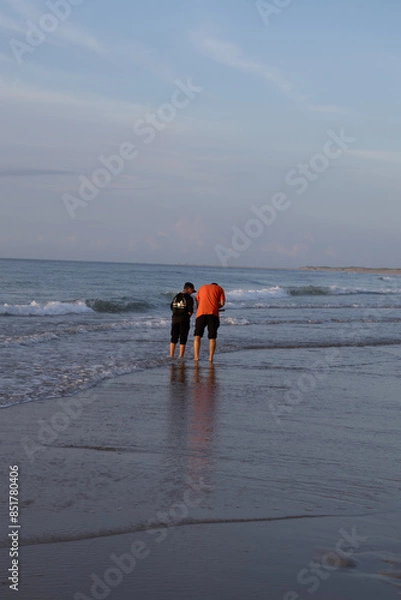 Obraz father and son on beach