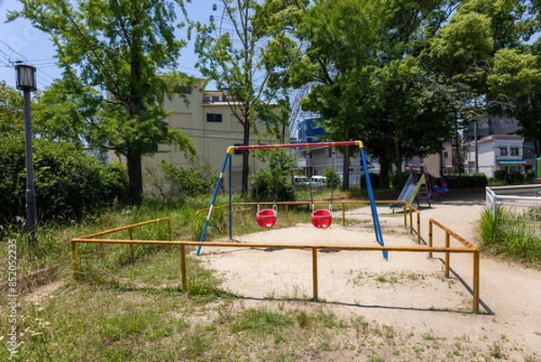 Fototapeta 晴れた日の公園のブランコ