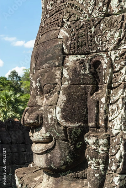 Fototapeta tower as metaphor of the mount meru with the head of lokeshvara and the face of jayavarman VII in the complex of the bayon in the archaeological angkor thom place in siam reap, cambodia