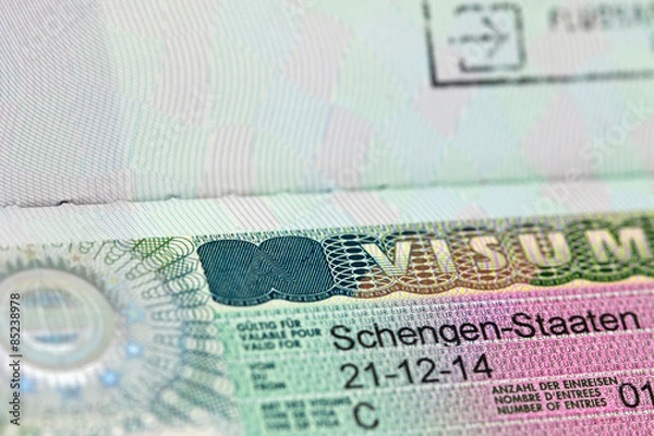 Fototapeta Closeup of the Schengen visa to Austria, Germany with shallow DOF
