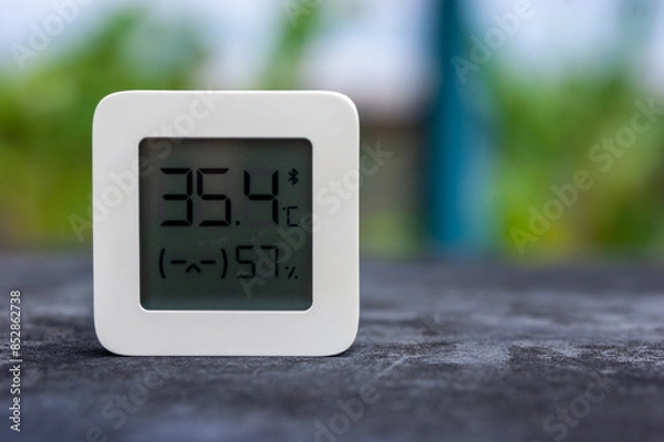 Obraz Best personal weather station device with weather conditions inside and outside. Home digital weather forecast concept with temperature and humidity.