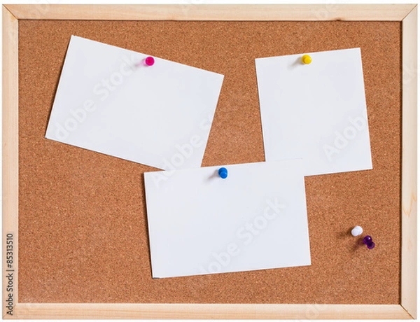 Fototapeta Blank papers pin up on cork board isolated on white background
