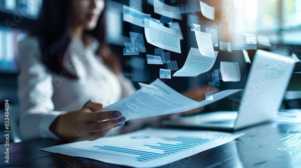 Obraz Digitized paperwork can be accessed remotely by authorized users.