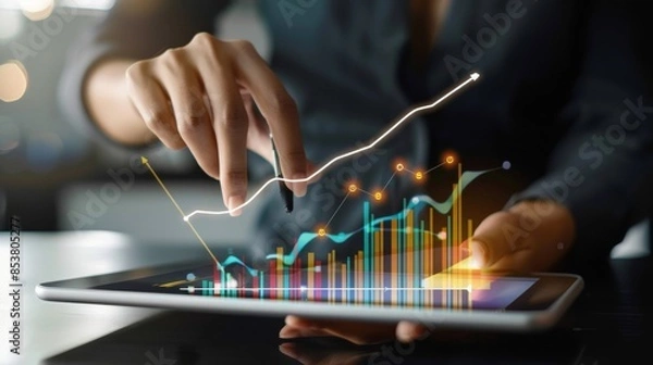 Fototapeta A CEO analyzing a business growth graph on a tablet, with revenue projections and market expansion strategies.