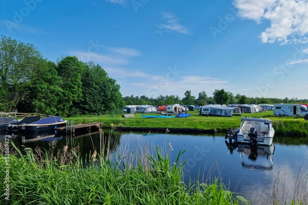 Fototapeta Camp site in lake district of Dutch province Friesland