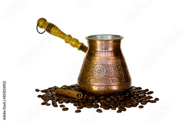 Fototapeta Copper coffee pot and scattered coffee beans.
