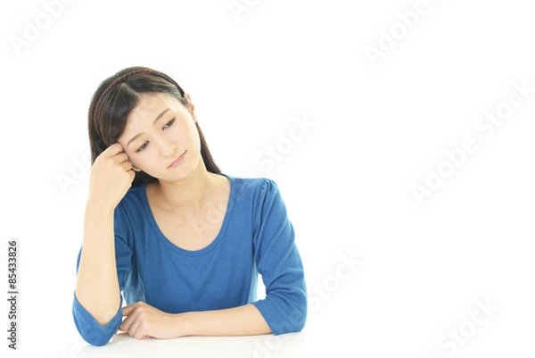 Fototapeta 憂鬱な表情の女性