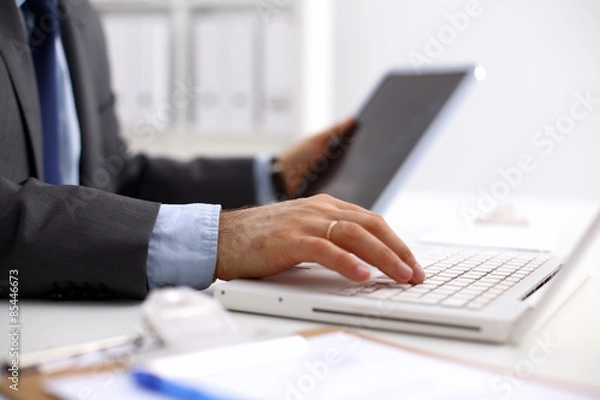 Fototapeta Designers table with notes and tools