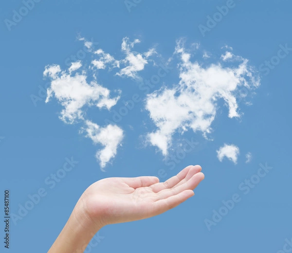 Obraz Hand and blue sky clouds map
