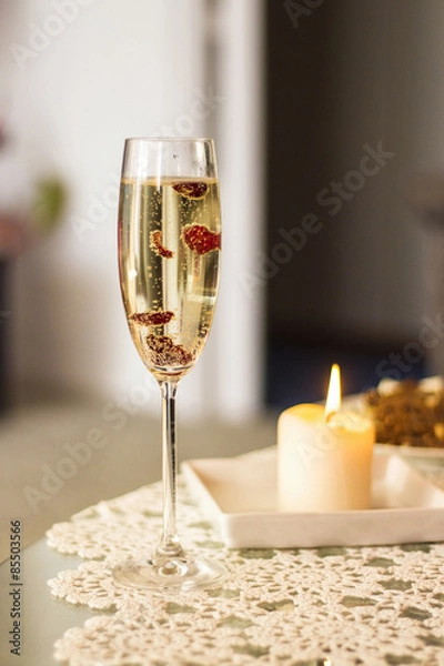 Obraz Champagne glass with cranberries