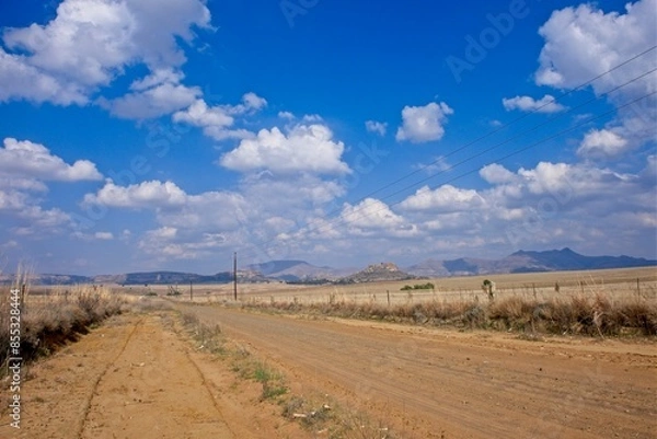 Fototapeta Rural farm road and scenery near Clarens in the Freestate Province of South Africa