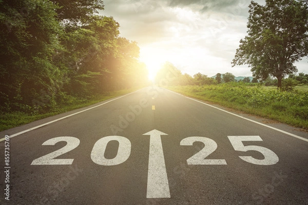 Fototapeta New year 2025 or straightforward concept. Text 2025 written on the road in the middle of asphalt road at sunset. Concept of planning , challenge, business strategy, opportunity ,hope, new life change.