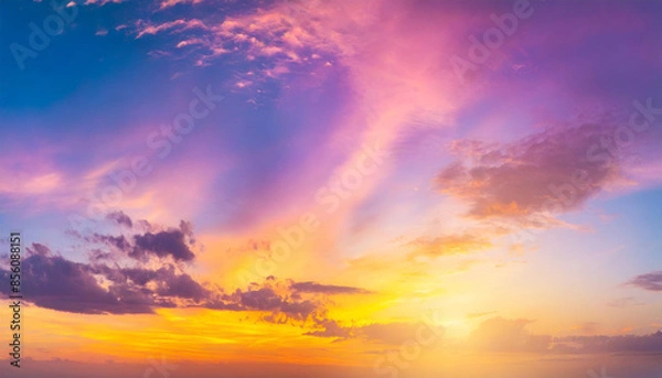 Fototapeta breathtaking fantasy sunset sky with vibrant rich hues of purple, pink, and yellow, creating a stunning gradient. The panoramic view evokes a sense of wonder and tranquility