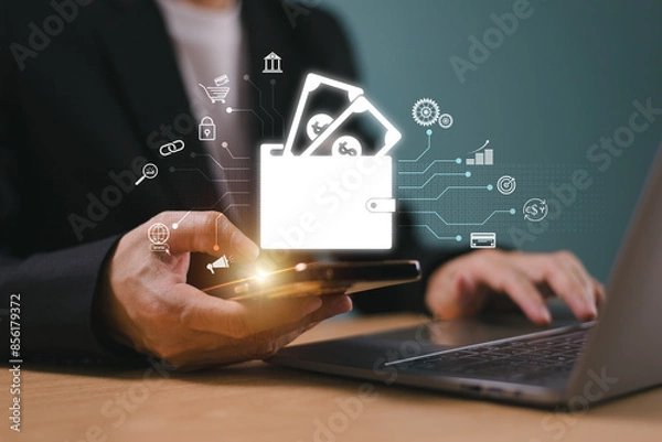Fototapeta Wallet digital payment icon on internet mobile banking, online wallet business concept. Businessman hold mobile phone, computer laptop online money transaction application. Bank e-commerce investment