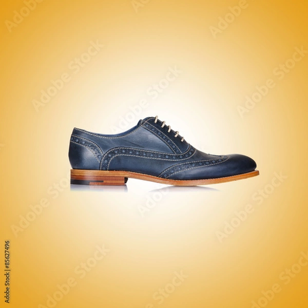 Obraz Fashion concept with male shoes against gradient 